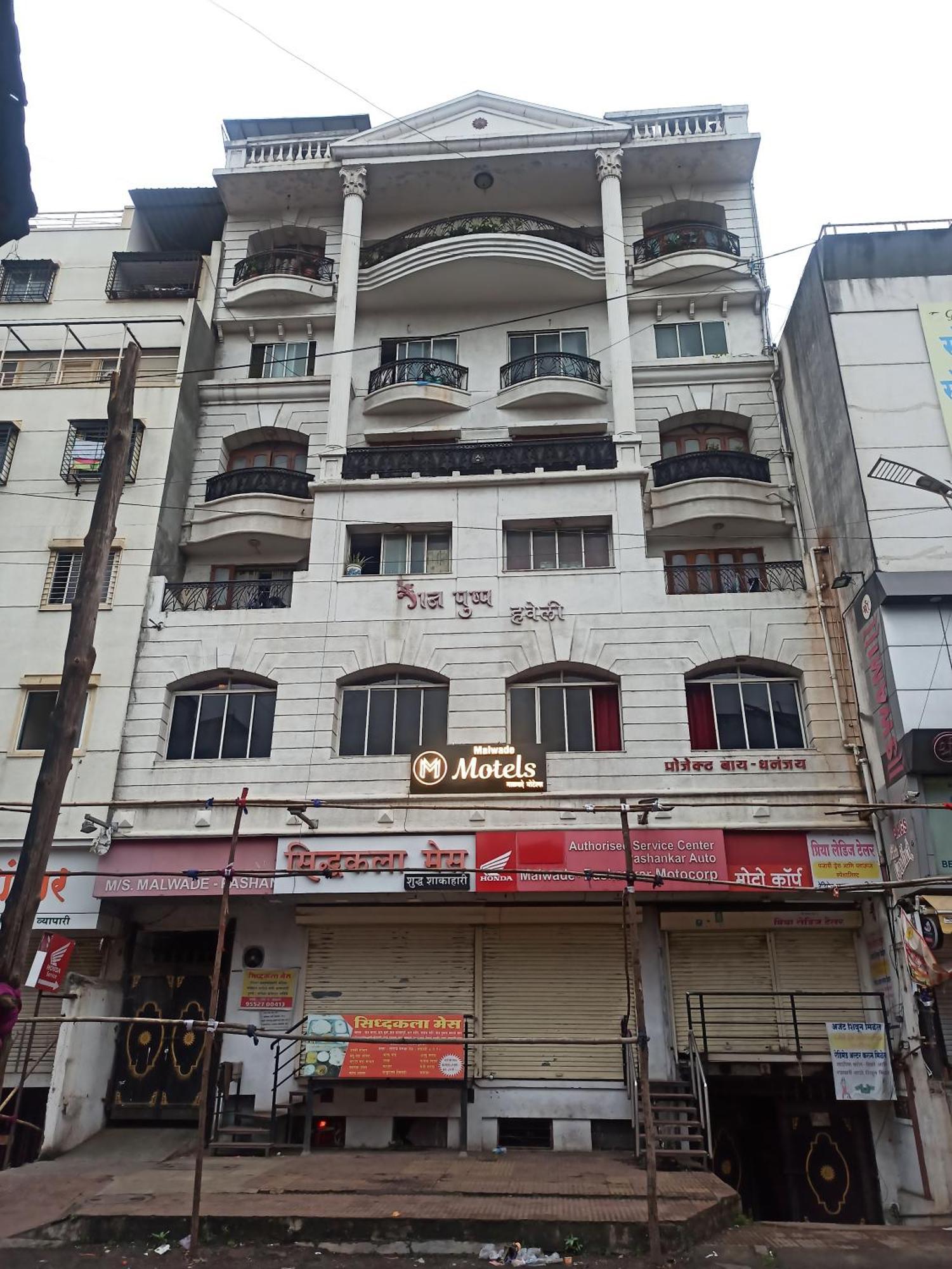 Malwade Motel Pune Bagian luar foto